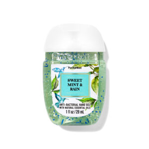 Stay fresh and germ-free with Bath & Body Works Sweet Mint & Rain Hand Sanitizer. Infused with a refreshing minty scent, it kills 99.9% of germs while keeping your hands soft.